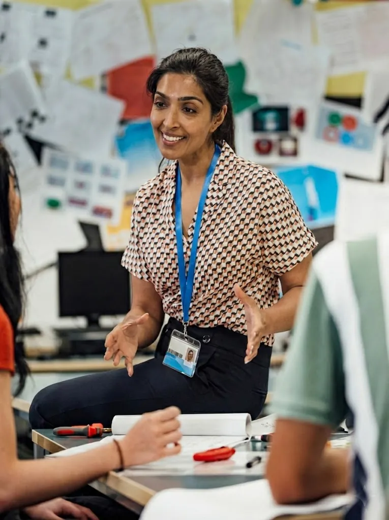 Female teacher in classroom with students